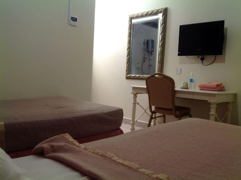 Hotel Morning Glory Kudat Habitación foto